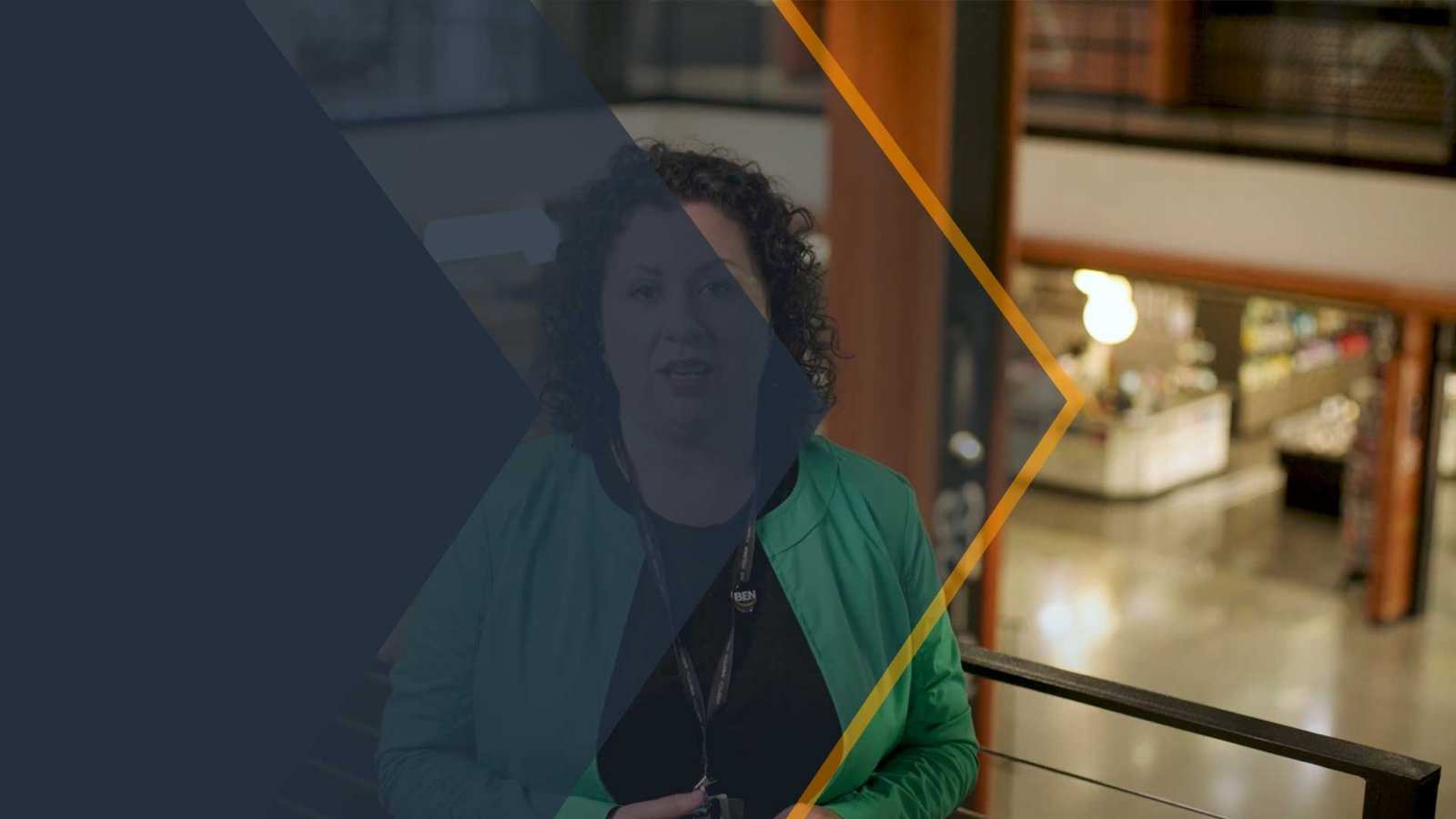 Transition design: a navy arrow with an orange edge sweeps over the interview