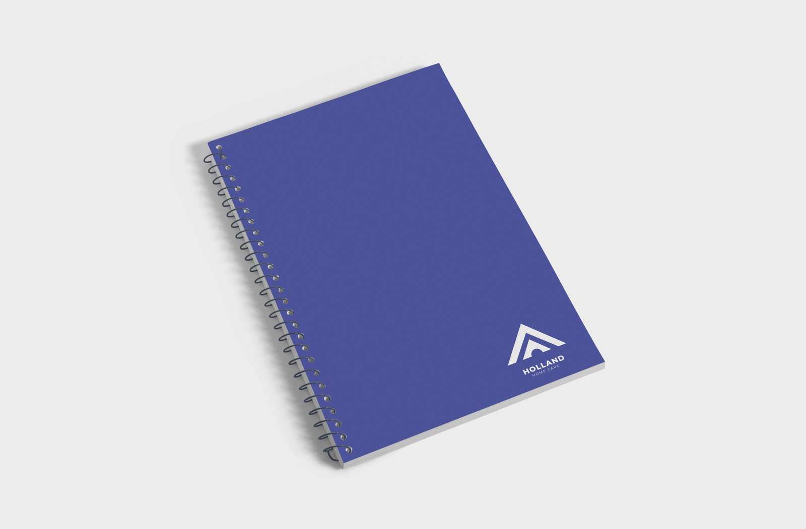 Navy spiral journal with the Holland mark