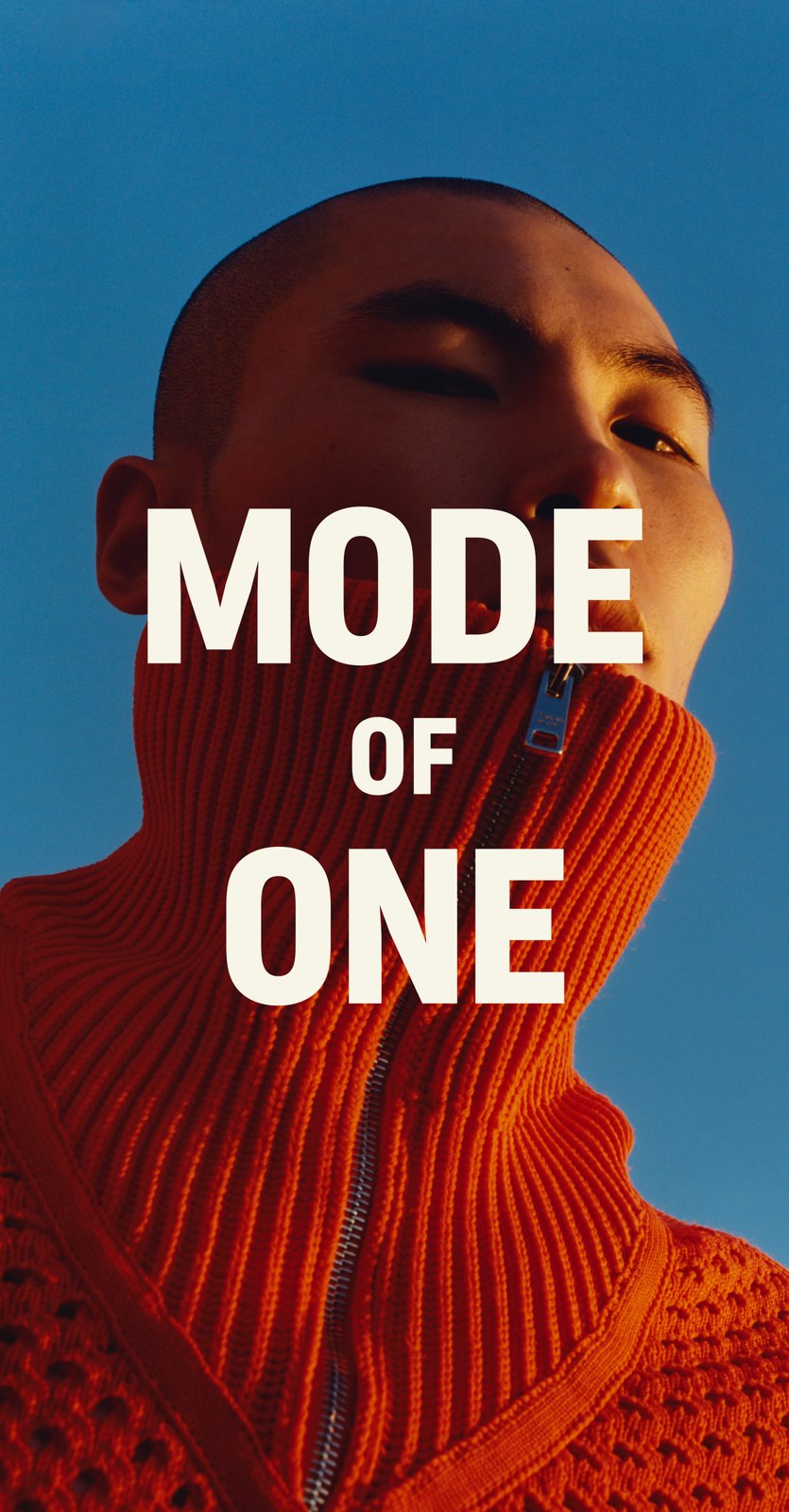 Mode of One poster: the stacked wordmark over a portrait in an orange knit, on blue