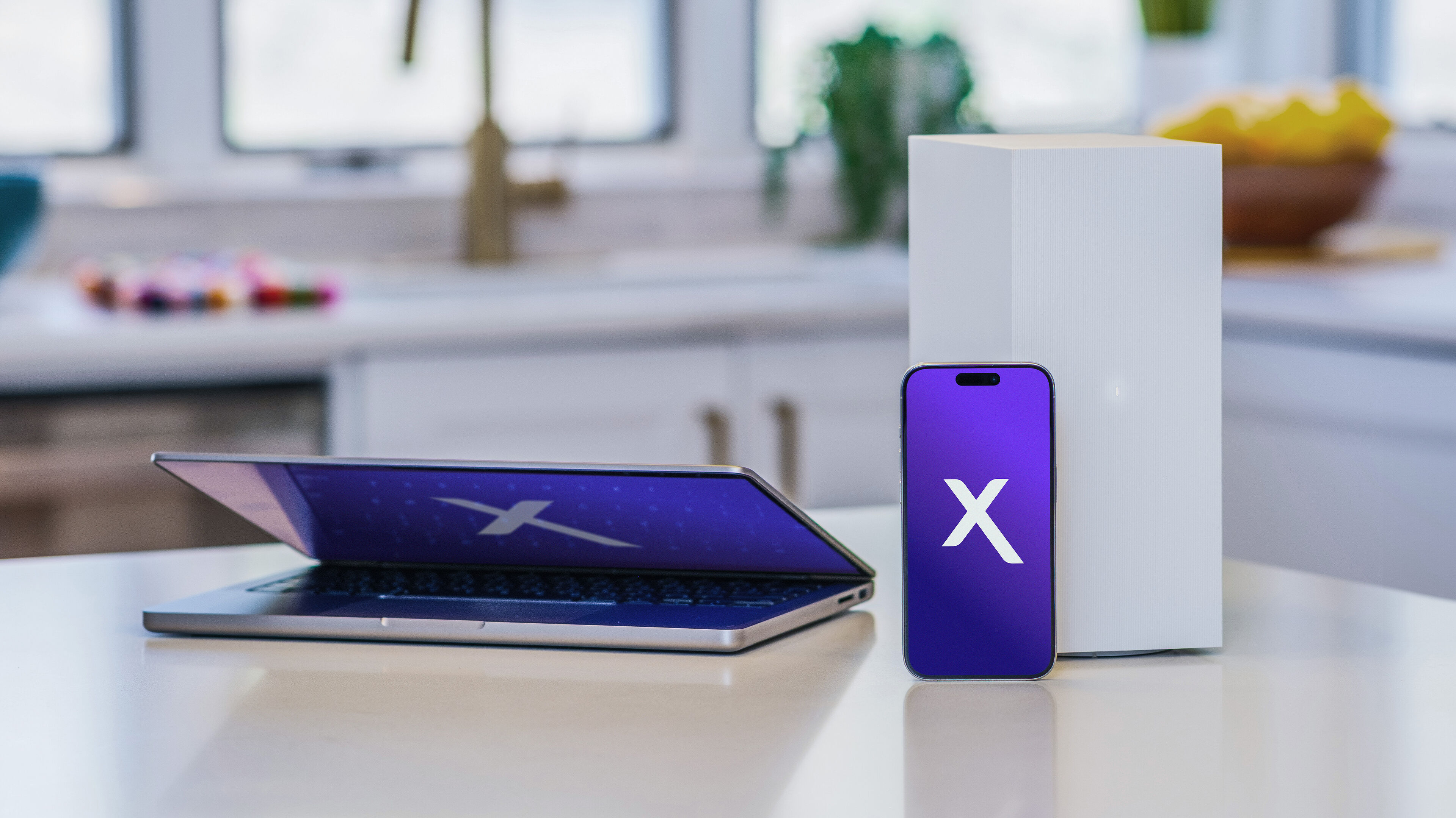 Xfinity Five-Year Price Guarantee, laptop, phone, and WiFi Gateway with the new pricing experience