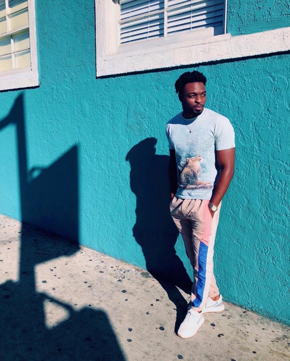 A showcased artist in a Cornman graphic tee