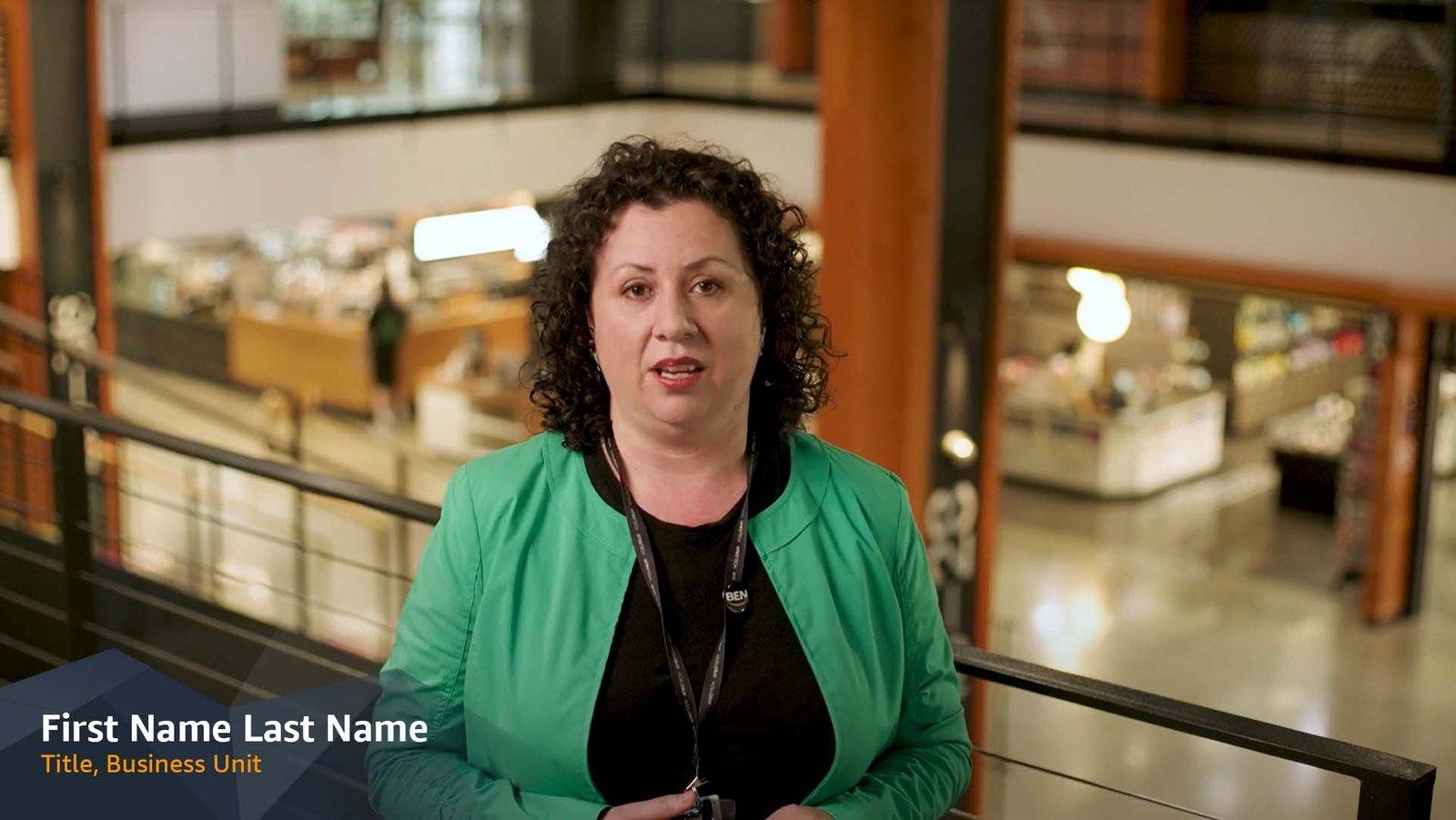 Lower third plate D, name and title over interview footage