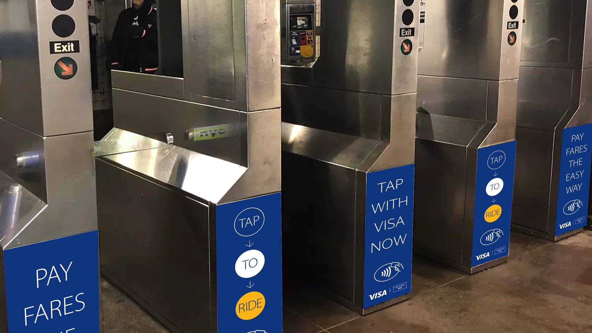 Visa turnstile, before: the earlier blue decals on the same turnstile